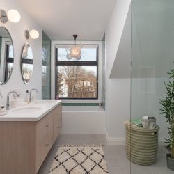 bathroom vanity and shower area