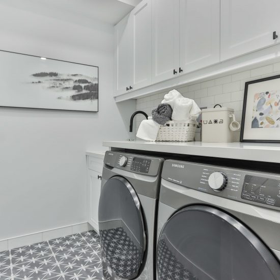 washing room with washing machine and dryer